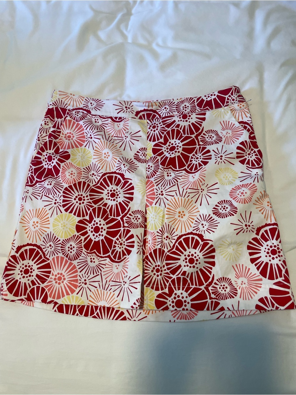 Golf Floral Print A-Line skirt with built in shorts. Flat front, pockets stretch